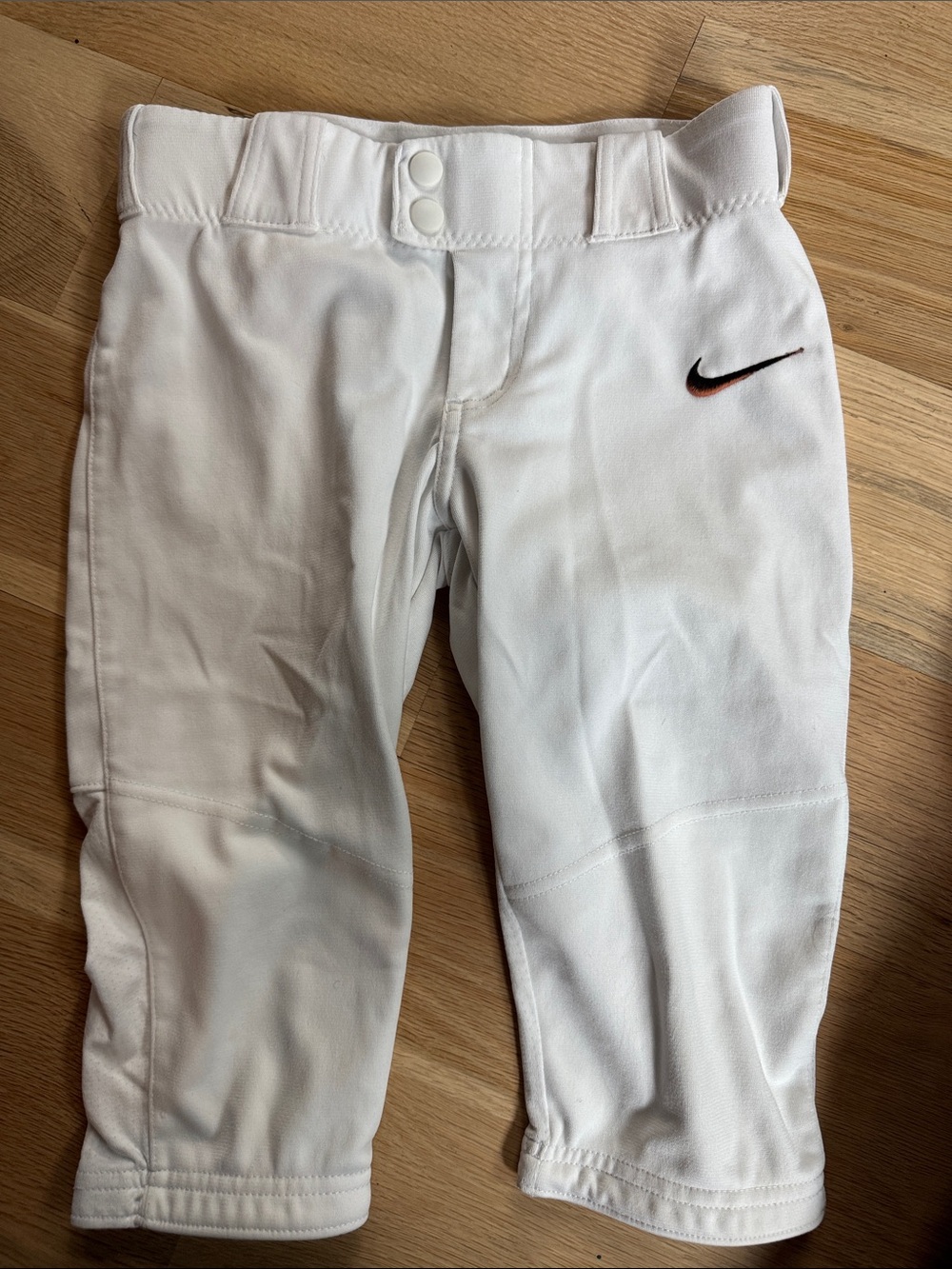 Nike White girls softball Pants with Black-Outlined Swoosh